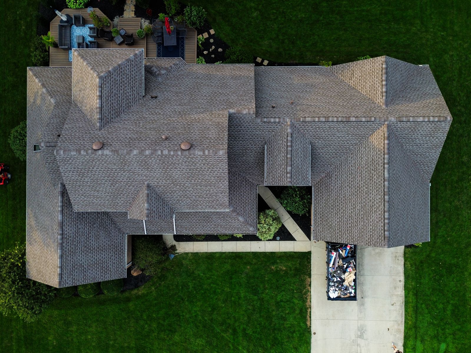 Top-down aerial of the completed architectural shingle roof over the full footprint — Hardin County, Ohio