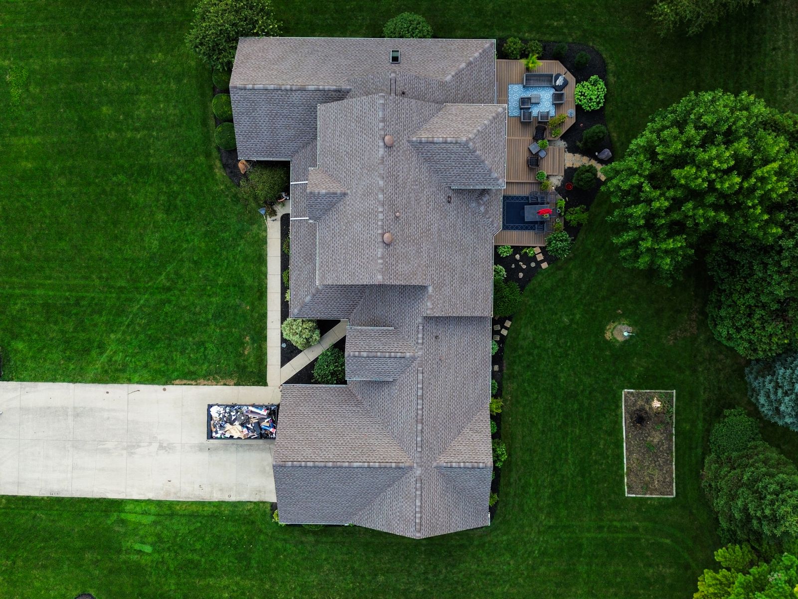 Overhead of the finished roof showing the rear deck and stepped rear planes — Hardin County, Ohio